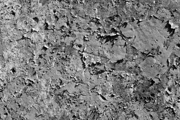 Grungy cement wall texture in black and white.