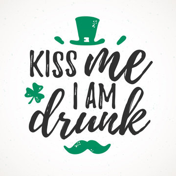 Kiss Me I Am Drunk funny handdrawn dry brush style lettering, 17 March St. Patrick's Day celebration. Suitable for t-shirt, poster, etc.