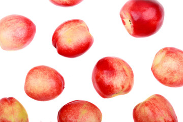 Set of red ripe peachesisolated on white