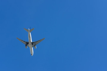 Airplane flying over head