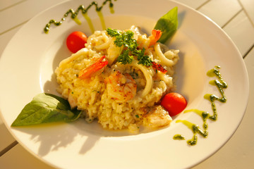 Risotto of squid and seafood, restaurant. Food.