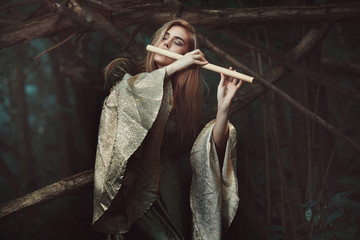Princess of the elves playing flute