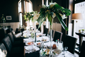 black wedding decoration and beautiful fresh flowers on the table