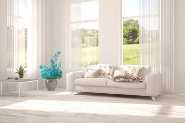 Idea of white room with sofa and summer landscape in window. Scandinavian interior design. 3D illustration