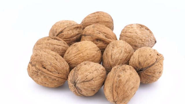 Walnuts isolated rotating on white background