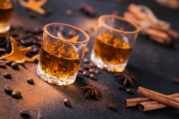 Whiskey, brandy or liquor, spices, anise stars, coffee beans, cinnamon sticks