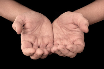 Two hands with open palms - hand gesture isolated on black background with copyspace