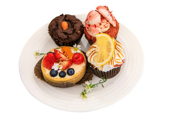 Fruit cake in the  plate isolated on white background with clipping path.