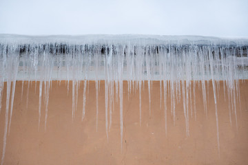 Icicles from the roof of the building.
