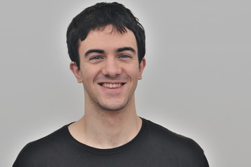 portrait of a joyful young man on a white background