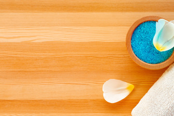 Bowl with scrub and towel. Copy space.