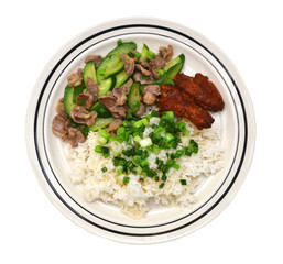 Chicken with rice and vegetables on white background