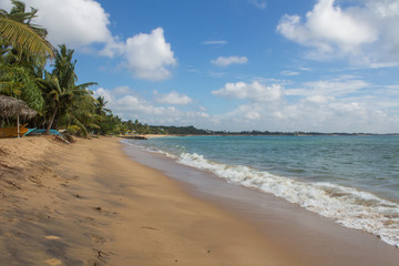 Sand and fishing boats on the beach.