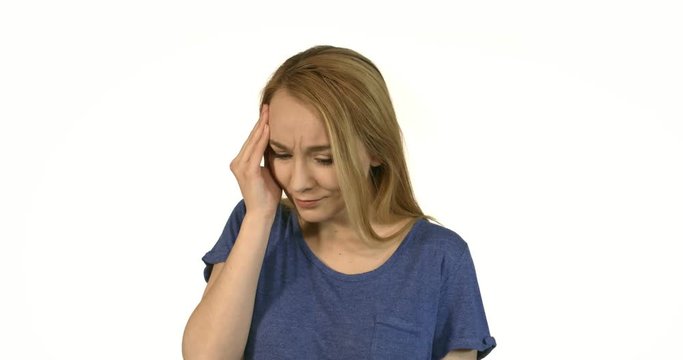 Young woman heaving headache.