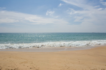 Beautiful beach. View of nice tropical beach with palms around. Holiday and vacation concept. Tropical beach.