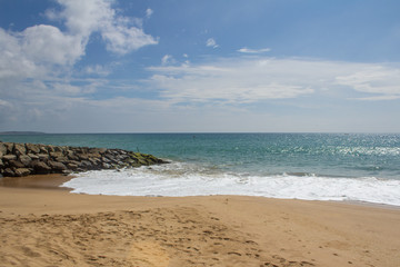 Beautiful beach. View of nice tropical beach with palms around. Holiday and vacation concept. Tropical beach.