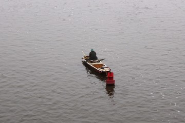 Czech Republic 2013: Lonely fisherman in the middle of the river