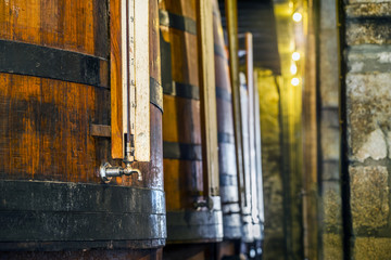 Fototapeta na wymiar Plenty of wine barrels in Porto area, Portugal