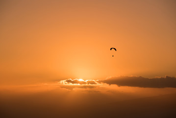 Paraglide shilouette at sunset