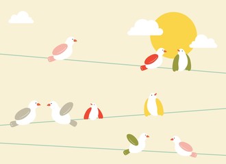 bright colorful birds sitting  on telephone lines