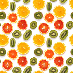 Seamless pattern of fresh fruits: red oranges, kiwi, isolated on white background, top view, flat lay. Food texture background. Healthy food, detox, diet.