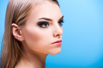 Fototapeta premium Close-up of a young girl face with creative visage face art