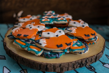 Cute fox shaped cookies for adventure and outdoor themed party and baby shower