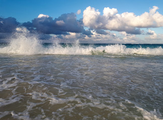 Clouds over the waves in the ocean
