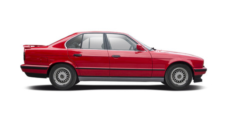 Fototapeta na wymiar Red family sedan premium car side view isolated on white background