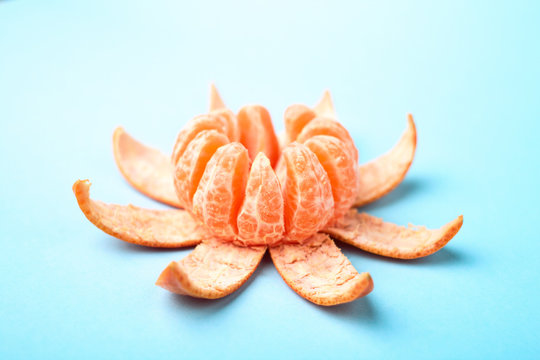Mandarin with peeled skin, citrus fruit