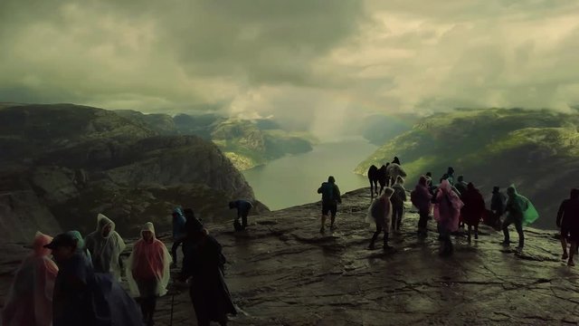 Aerial view from drone on breathtaking lysefjord during the rain. Cloudy sky. 4k footage, drone view. Preikestolen, Norway.