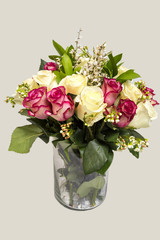 Flower arrangement of white and pink roses