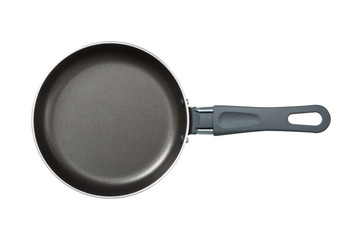 Pan. The black. Kitchen accessories. Tools for cooking. A spoon. Isolated on white background. For your design. An object.