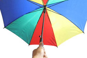 Holding multicolored umbrella isolated in hand