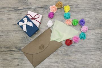 Fototapeta premium Rose flowers Out Of A Forgive Me Letter. Flat lay image.