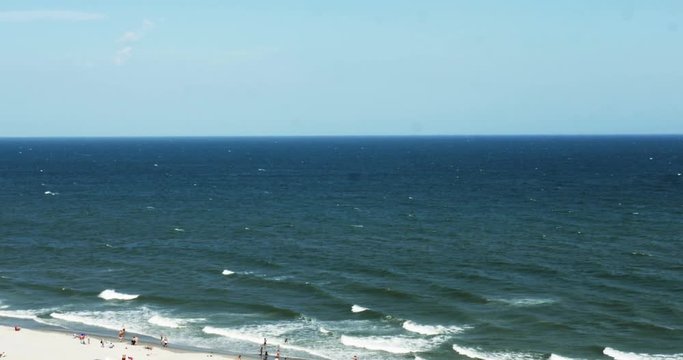1850 People Enjoying the Beach with Ocean Waves, 4K