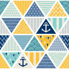 Seamless pattern with nautical elements, patchwork tiles. Can be used on packaging paper, fabric, background for different images, etc. Freehand drawing