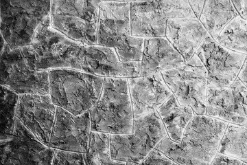 Obraz premium Fragment of a wall from a chipped stone