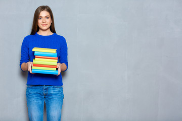 Studen school, university girl holding books.