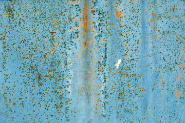 texture of old metal with rust, blue spotted, close-up