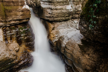 Obraz premium Powerful waterfall flowing down in Georgia. Martvili canyon. Okatse canyon