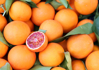 oranges at grocery shop - tarocco blood orange - sanguine orange