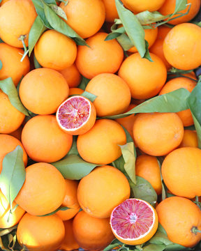 oranges at grocery shop - tarocco blood orange - sanguine orange