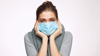 Sick woman wearing medical mask on face.