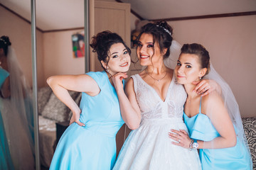 Bride and bridesmaids during the wedding preparations