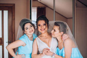 Bride and bridesmaids during the wedding preparations