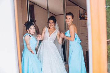 Bride and bridesmaids during the wedding preparations
