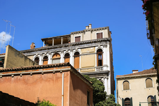 Historic architecture with old medieval buildings in Venice, Italy, Europe.