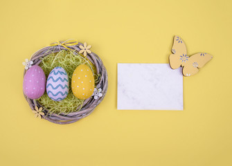 Creative easter composition with painted eggs.