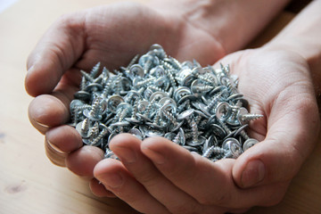 Full hands of screws